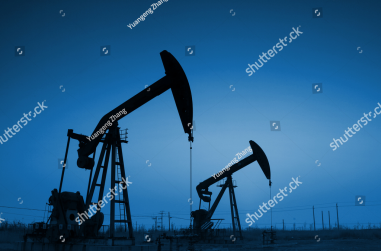 stock-photo-crank-balanced-beam-pumping-unit-under-the-curtain-of-night-in-the-jidong-oilfield-on-december-229824091