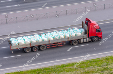 stock-photo-heavy-truck-with-trailer-and-bulk-cargo-in-bags-industrial-sulfur-chemicals-poisons-dangerous-1779976985